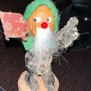 Whimsical Nutcracker Figurine with Green Hood